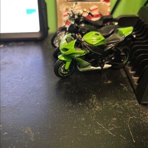 Green and Black Racing Toy Motorcycle